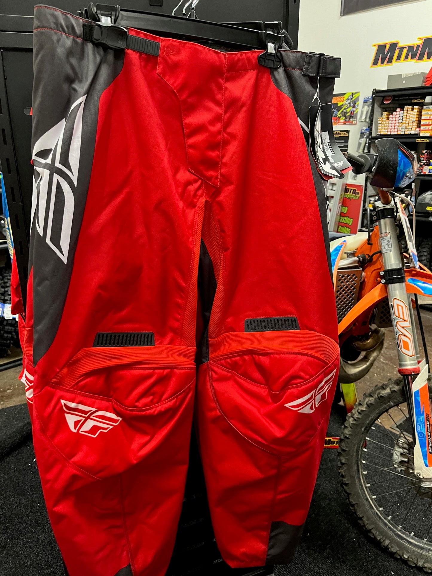 Red FLY racing riding pants